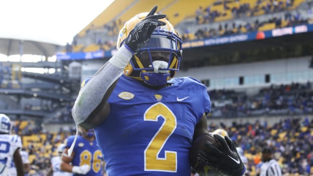 Nov 19, 2022; Pittsburgh, Pennsylvania, USA; Pittsburgh Panthers running back Israel Abanikanda (2) celebrates his touchdown against the Duke Blue Devils during the first quarter at Acrisure Stadium. Mandatory Credit: Charles LeClaire-USA TODAY Sports